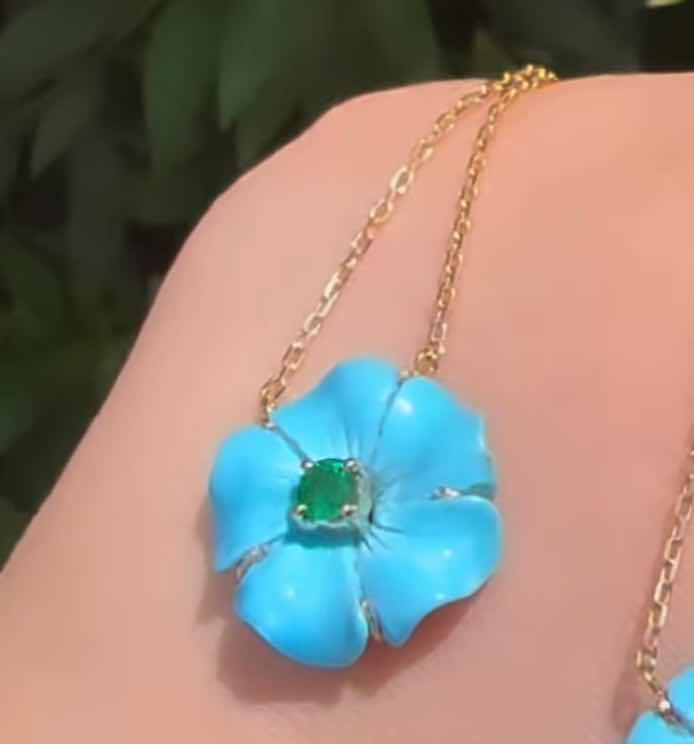 Turquoise flower pendant and emerald